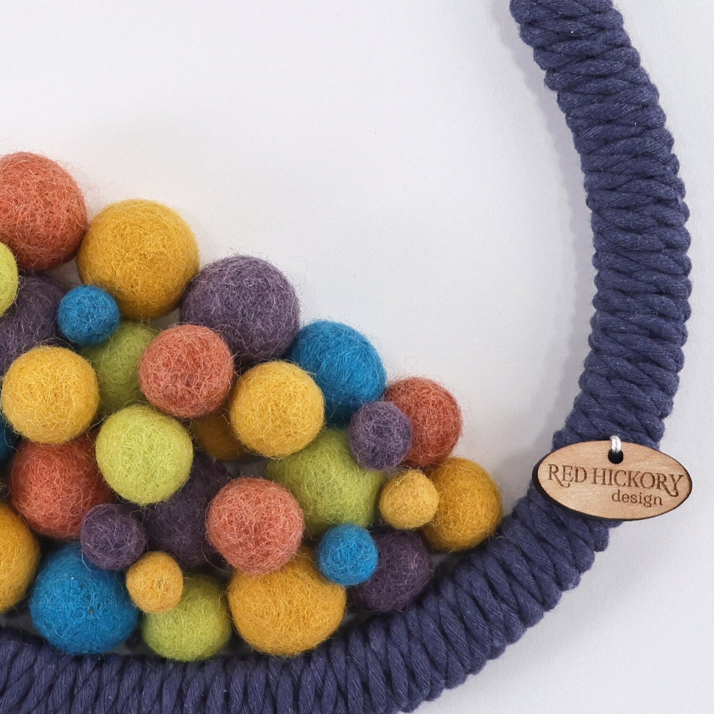 Bunny nursery wall art decor, navy organic cotton yarn, felt pom-poms, handmade natural materials, bedroom decor.